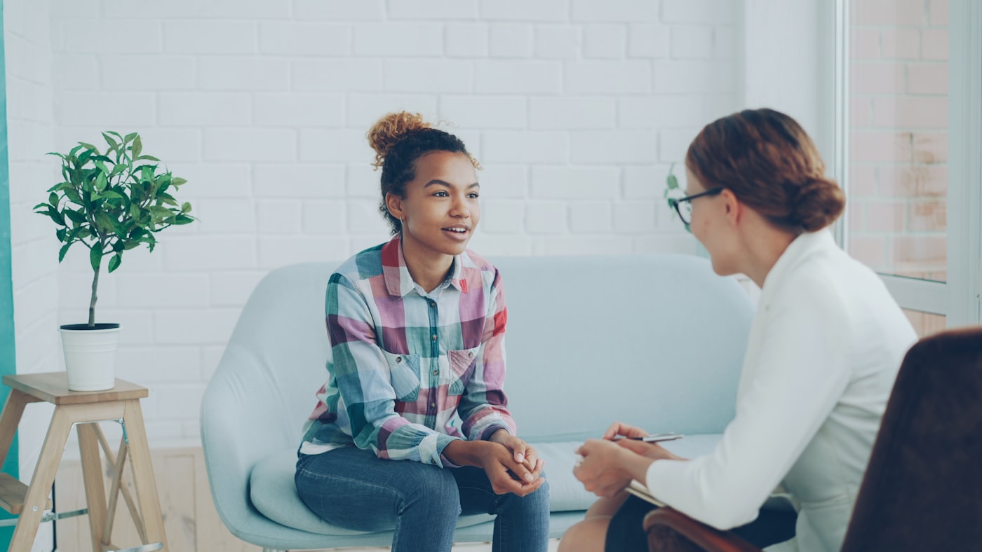 A provider and client in conversation
